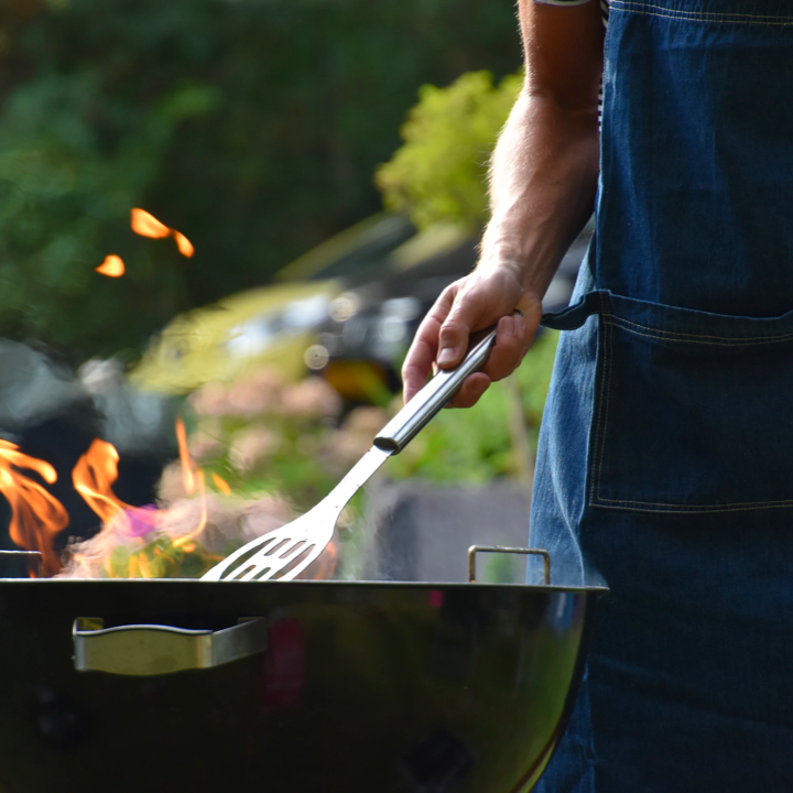 A man is grilling