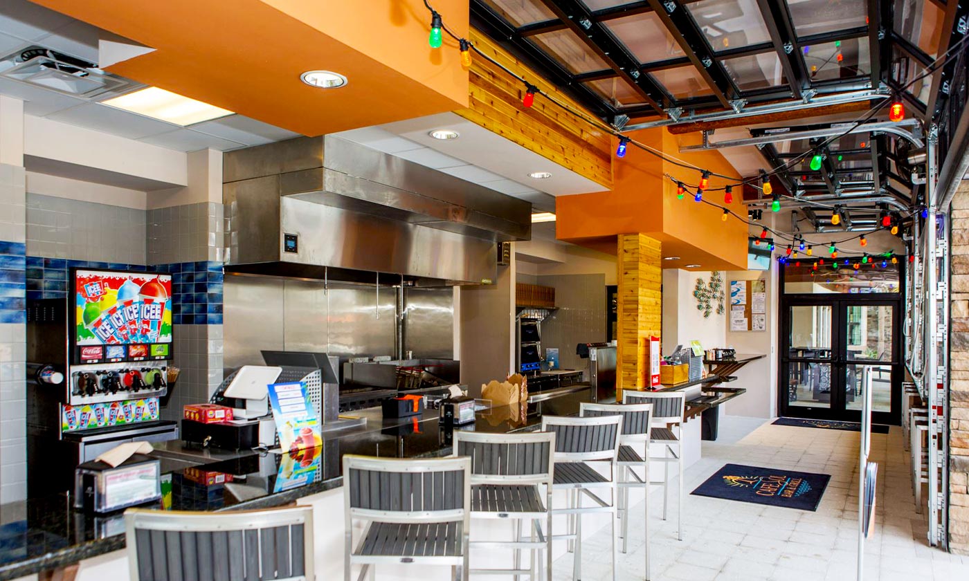 Resort eating establishment with snacks and bar stools